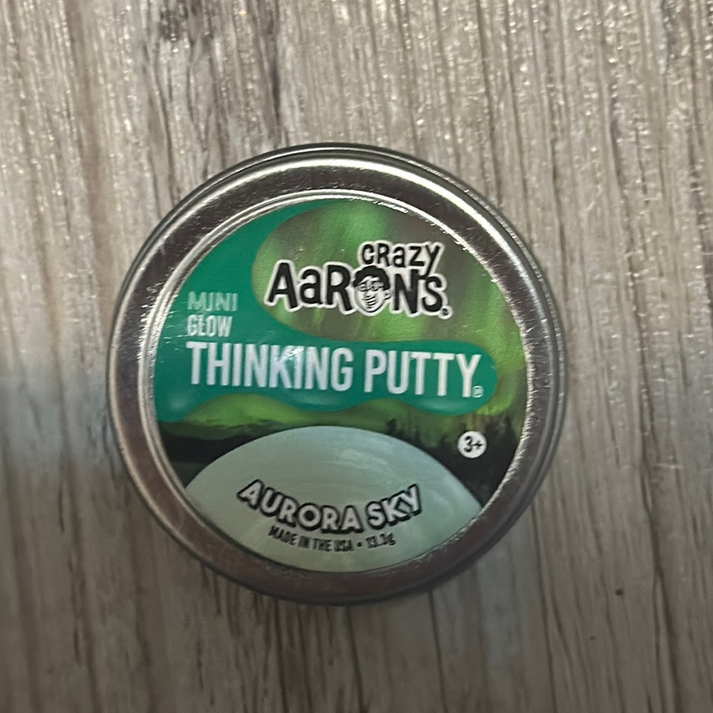 glows green in the dark, called aurora sky, made by crazy aarons.